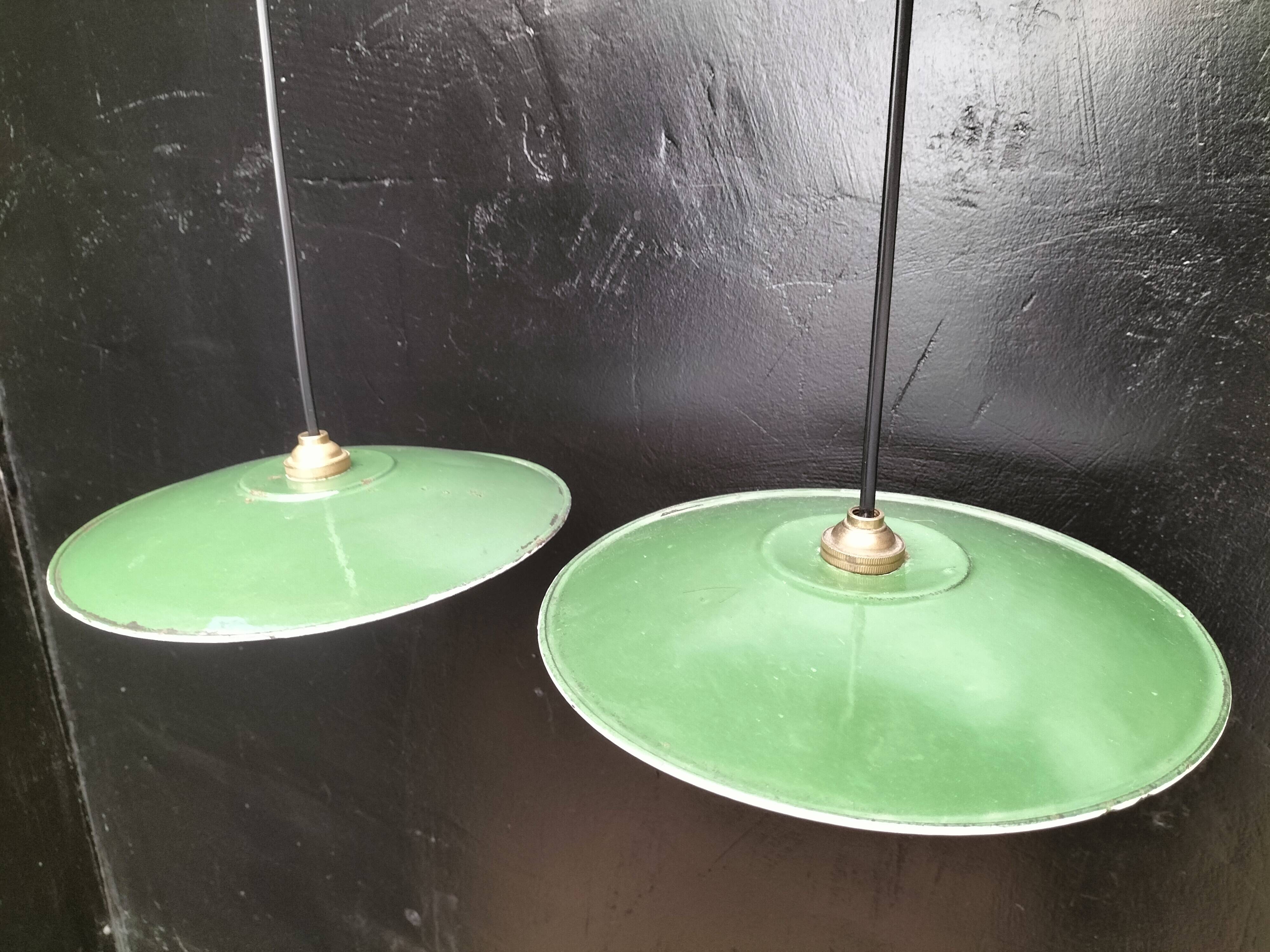 Three enamelled sheet metal suspensions