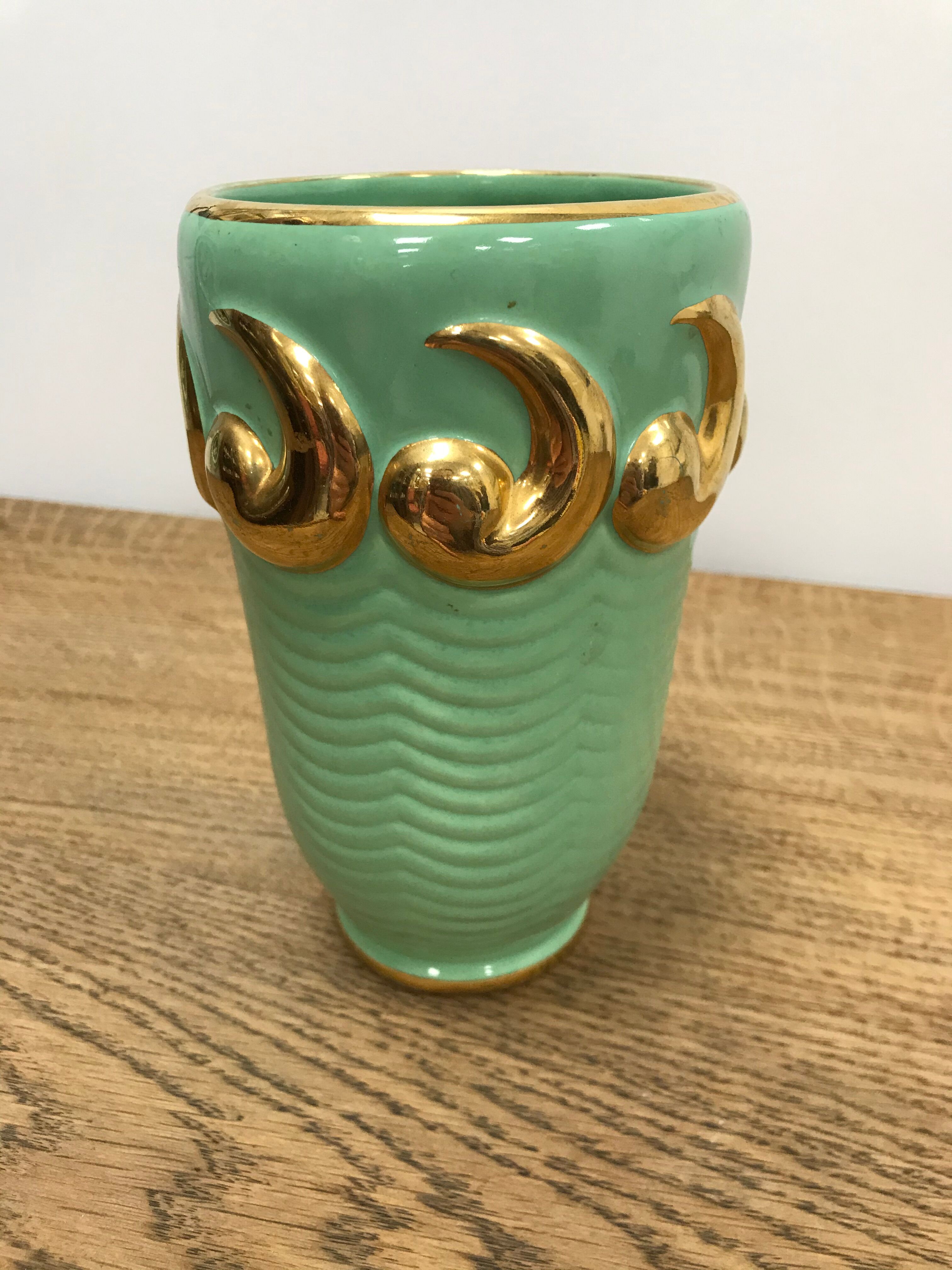 Green and gold ceramic vase