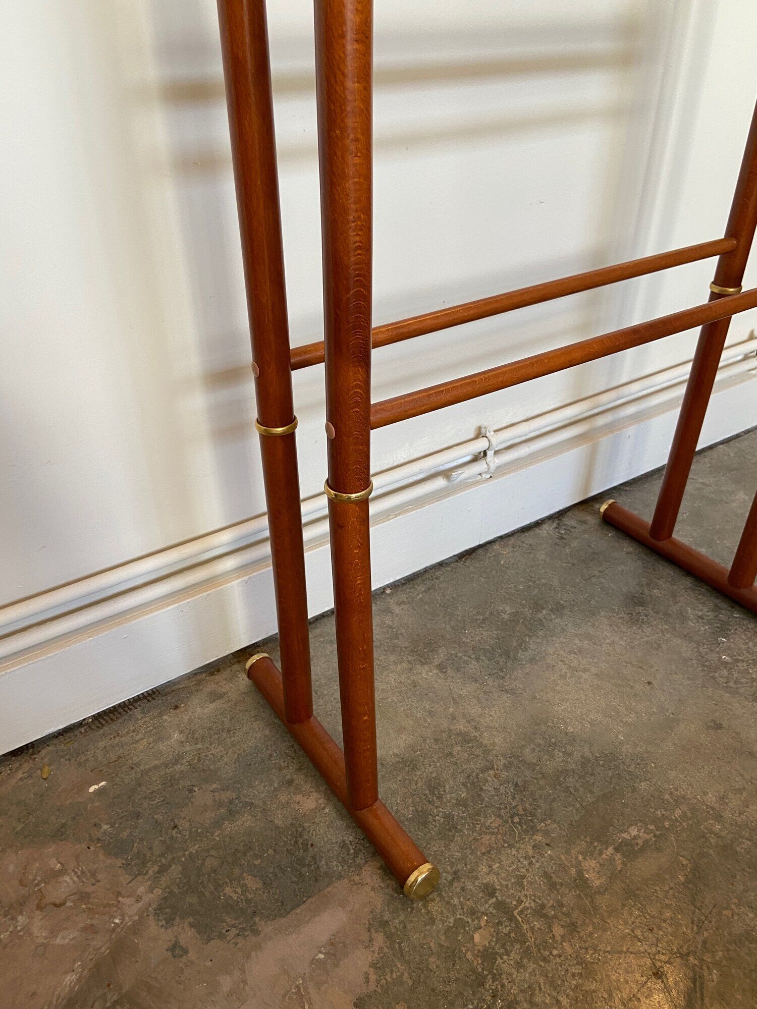 Dark wood towel rail