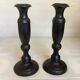 Pair of large black metal candlesticks