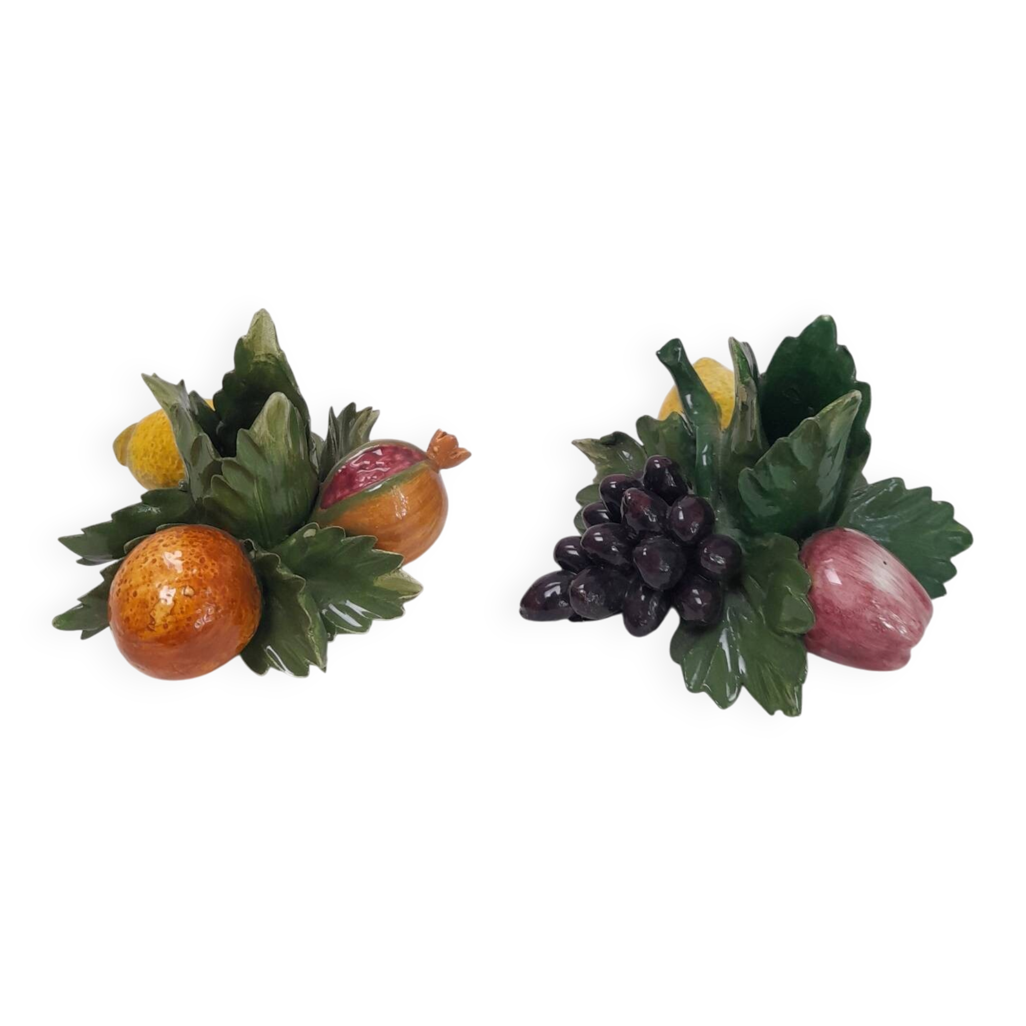 Pair of fruit candle holders in Italian majolica.