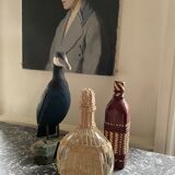 Wicker-sheathed glass bottle