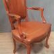 Louis XV style armchair covered in leather.