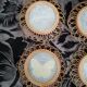 6 coasters in wooden wicker and butterfly background