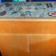 New oak storage furniture with a signed artisanal mosaic top.