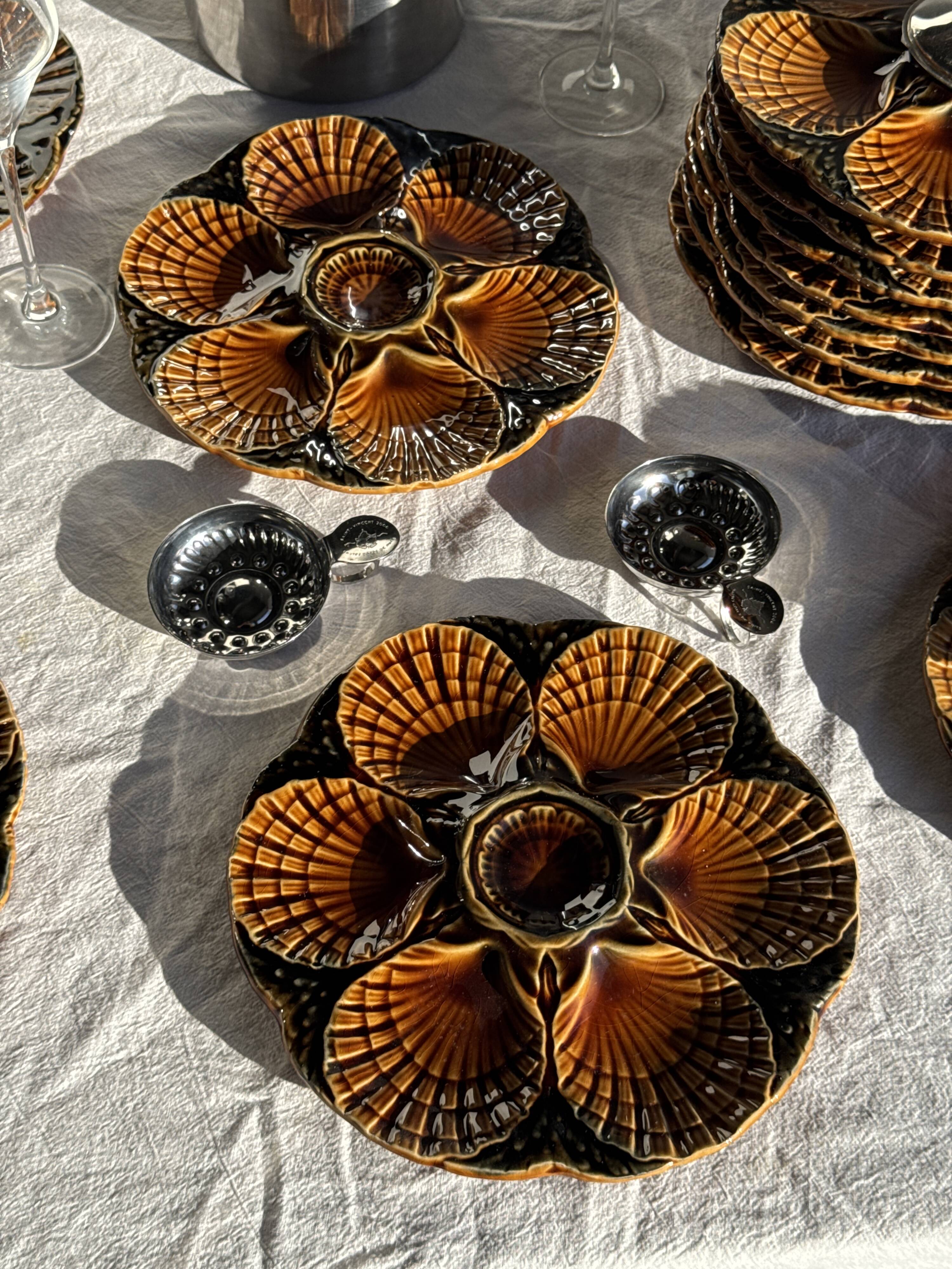Set of 12 oyster or shell plates in glazed brown ceramic D