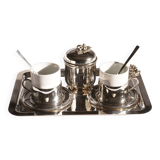 Silver-plated metal coffee service with a grape design.