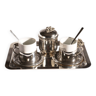 Silver-plated metal coffee service with a grape design.