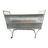 Vintage wicker bed with casters from the 50s in perfect condition