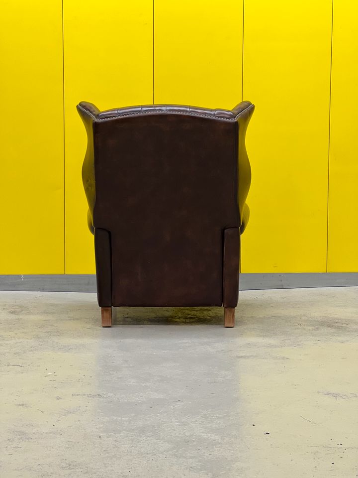 Brown vintage handmade chesterfield recliner armchair