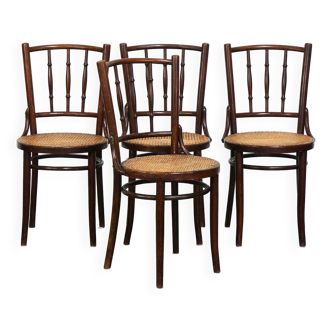 4 antique wooden and cane bistro chairs
