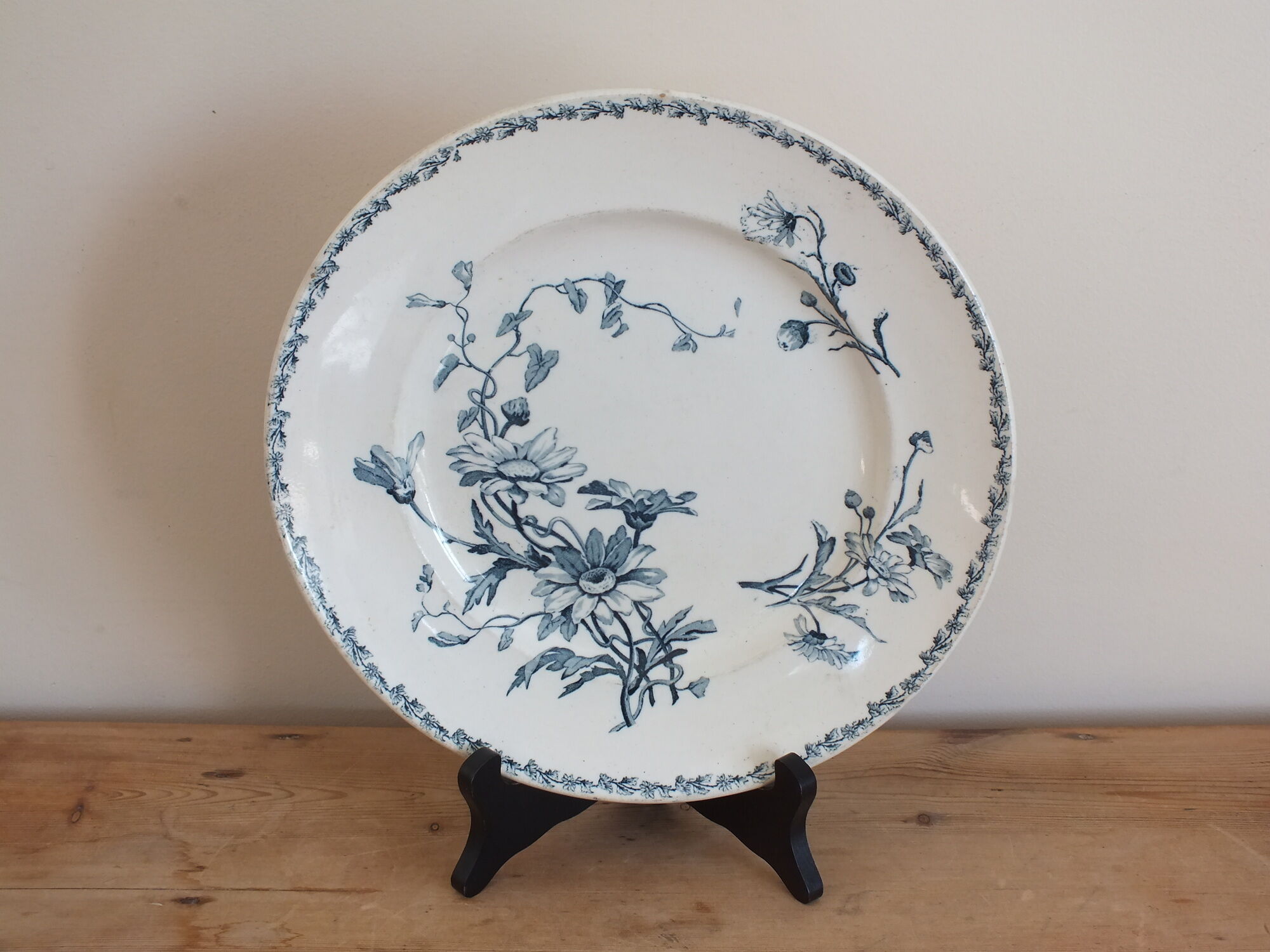 Old round dish in Terre de Fer Lunéville KG Marguerite