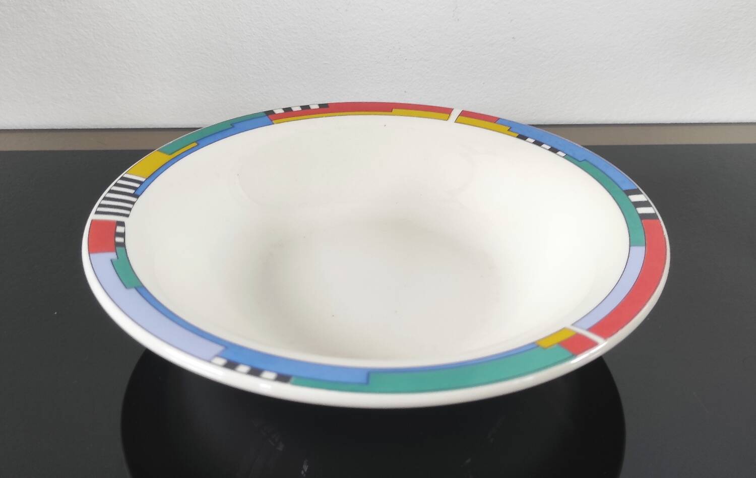 Set of 4 vintage Memphis style deep plates.