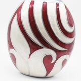 Red and white metal vase