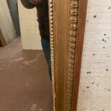 Louis XVI style mirror in wood and gilded stucco XIX century