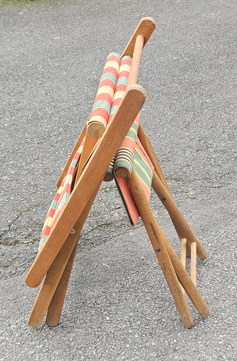 Folding canvas chair with stool, 1950s.