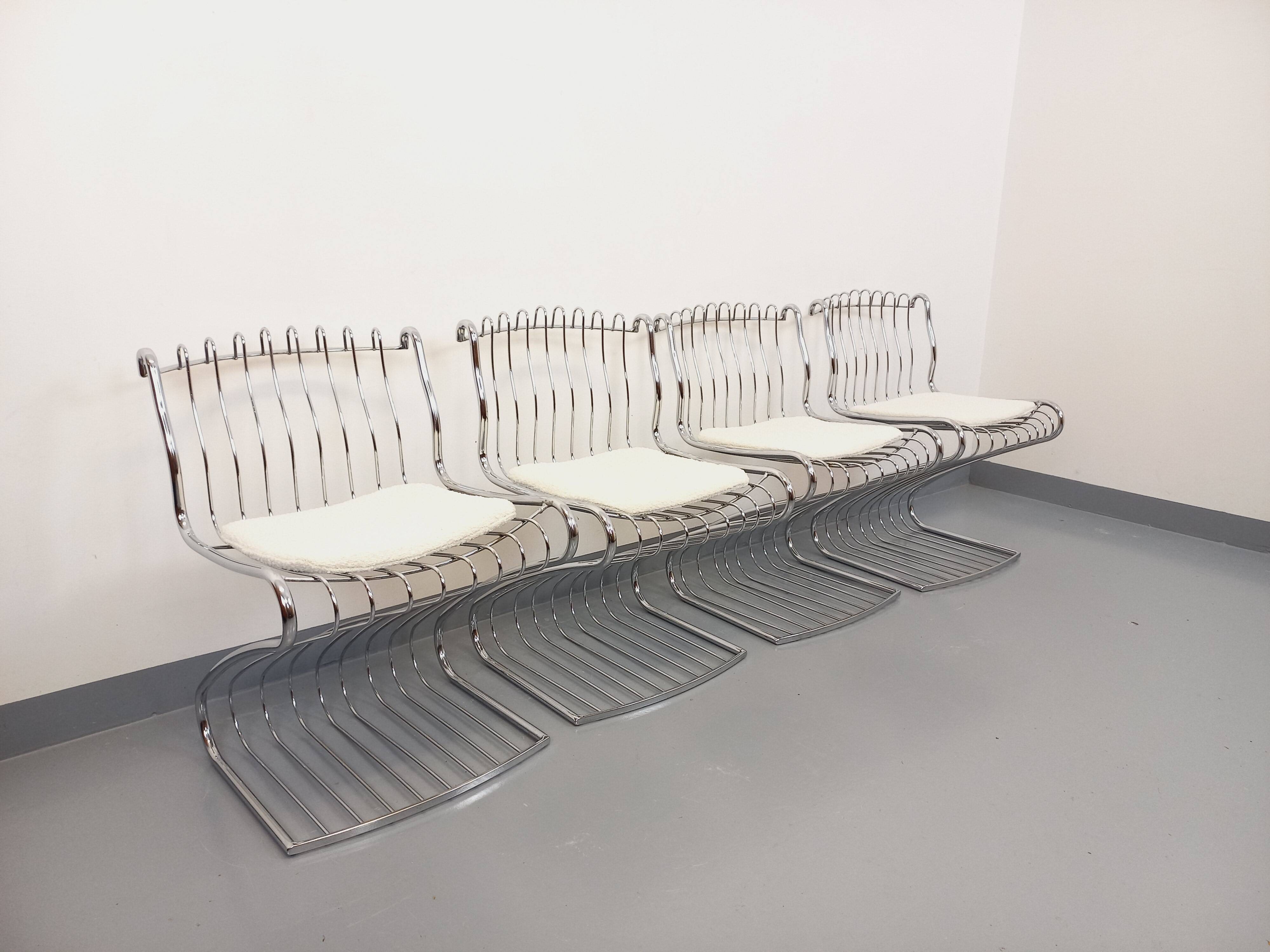 Set of 4 vintage Italian chairs by Gastone Rinaldi in chrome metal.