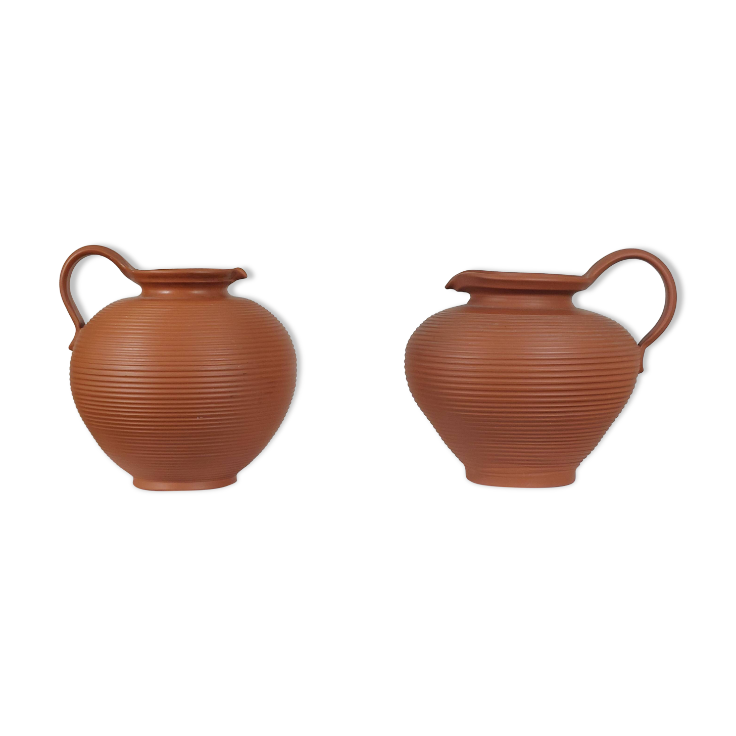 Pair of handcrafted terracotta vases from the mid-century.
