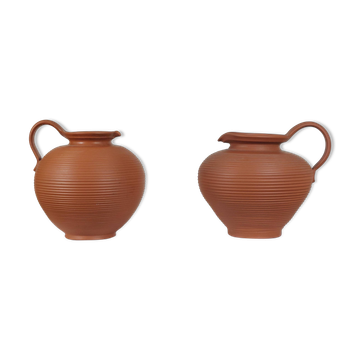 Pair of handcrafted terracotta vases from the mid-century.