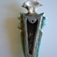 Surreal ceramic sculpture in relief signed to be identified.