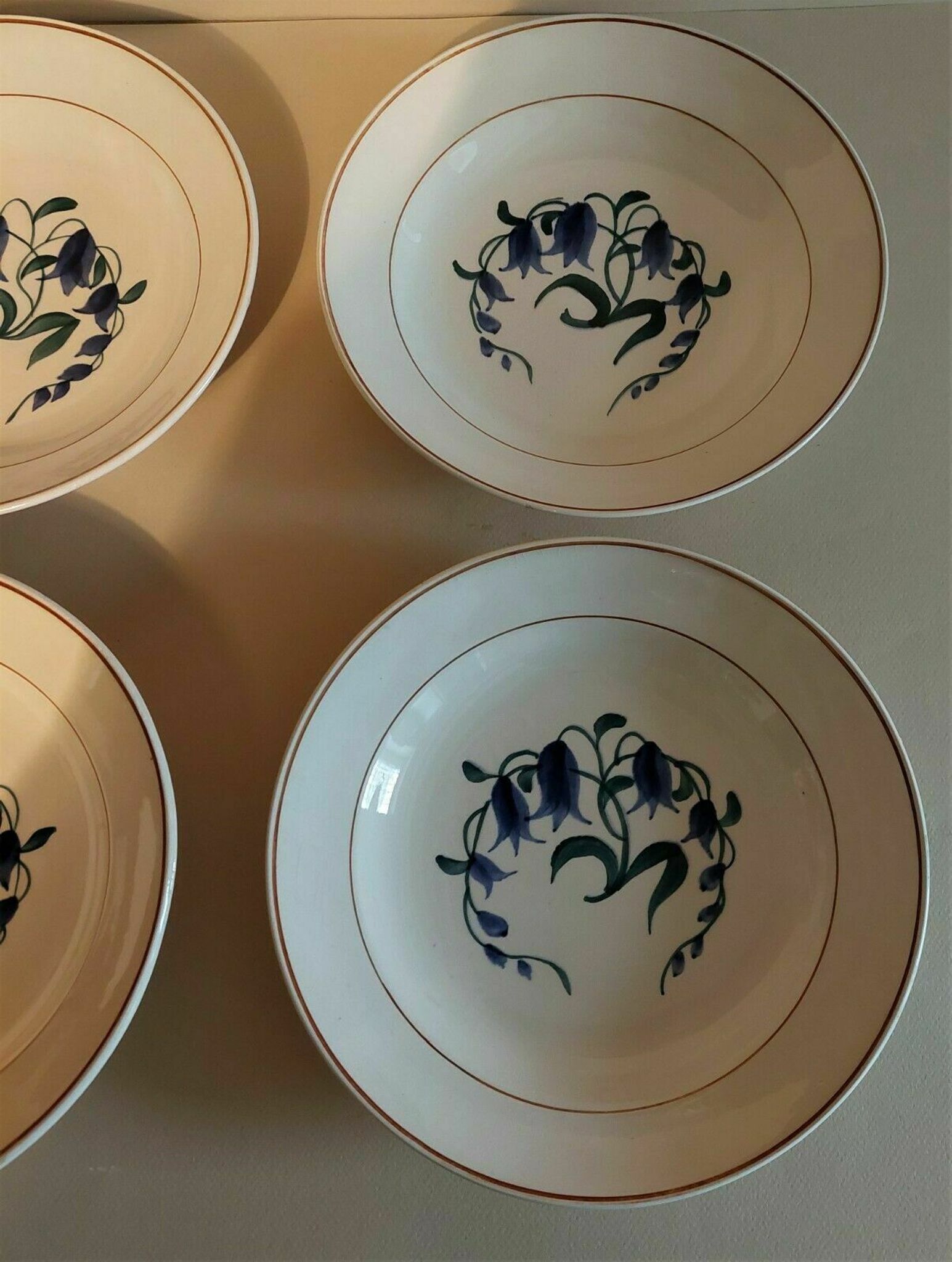 Assiettes creuses série de six faïence de Longchamp décor Simone