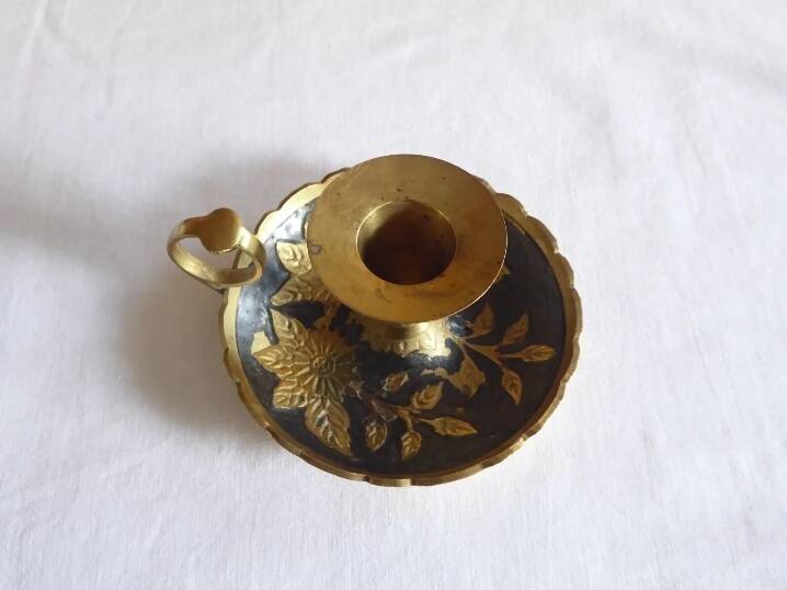 Brass hand candle holder