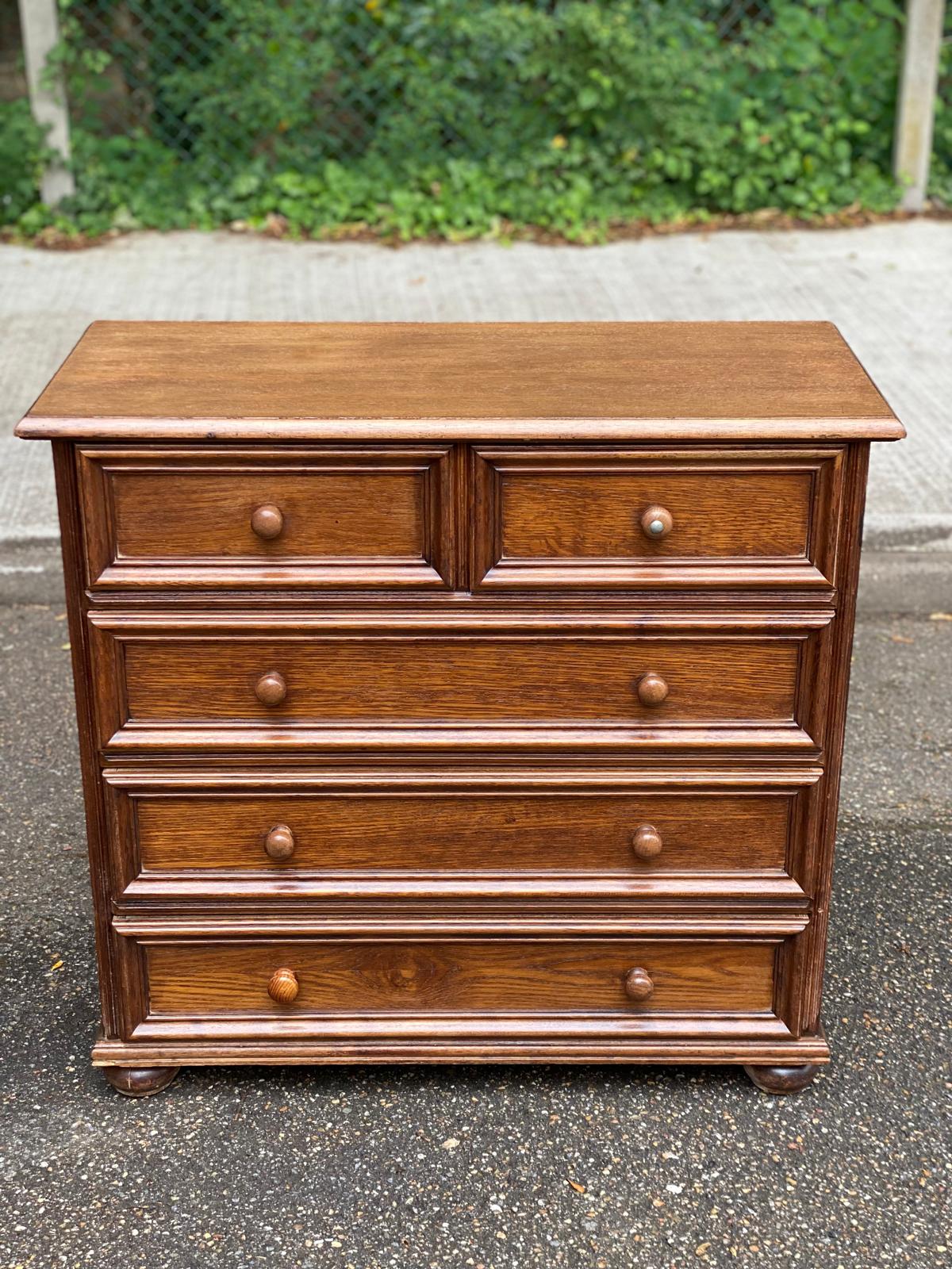 Vintage Louis XIV commode from the 1950s in dark oak.