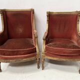 Two Louis XVI style wing chairs in gilded wood, 20th century