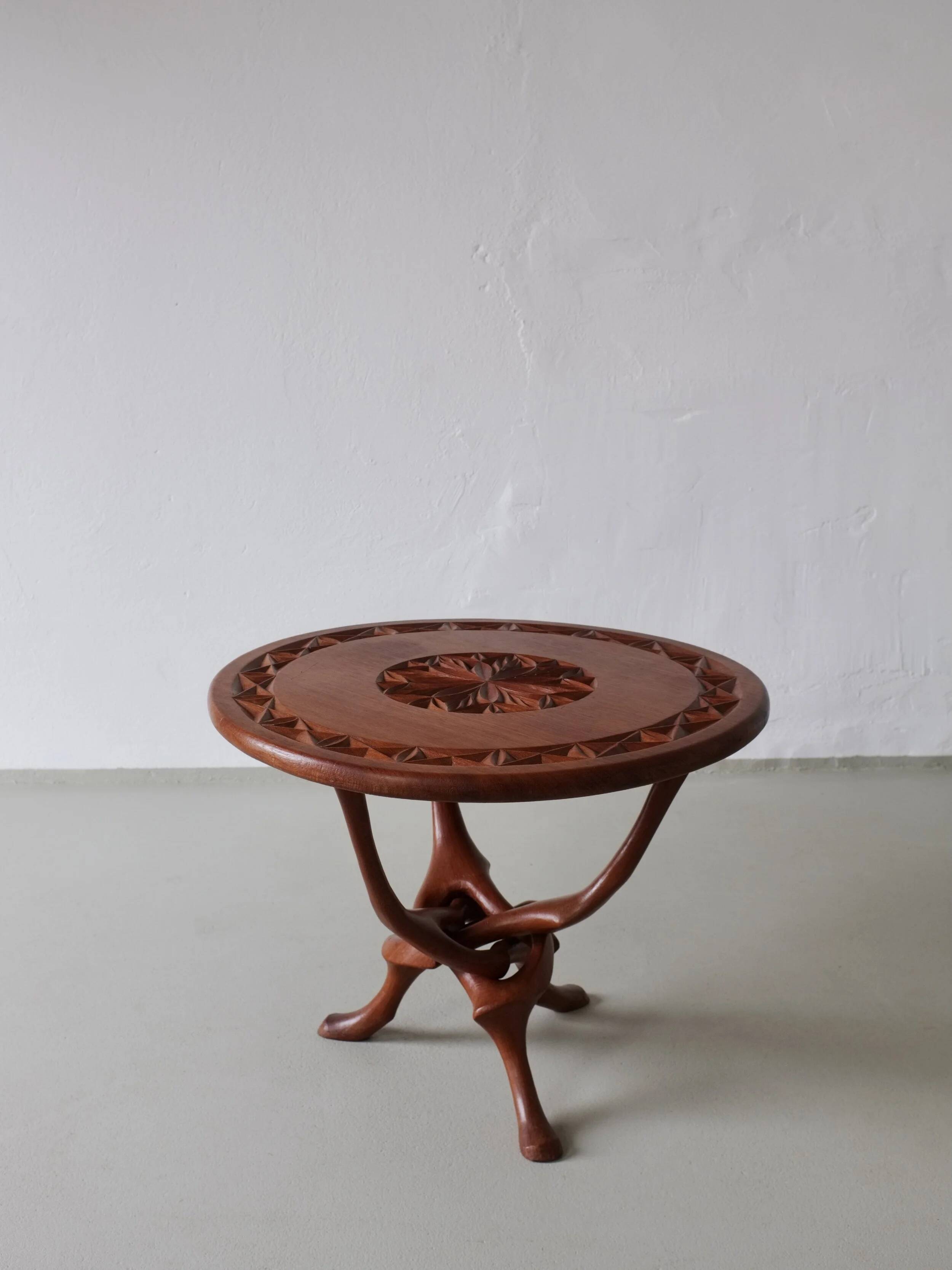 Sculptural carved teak side table | 1960s