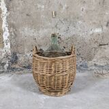 Demijohn with her basket