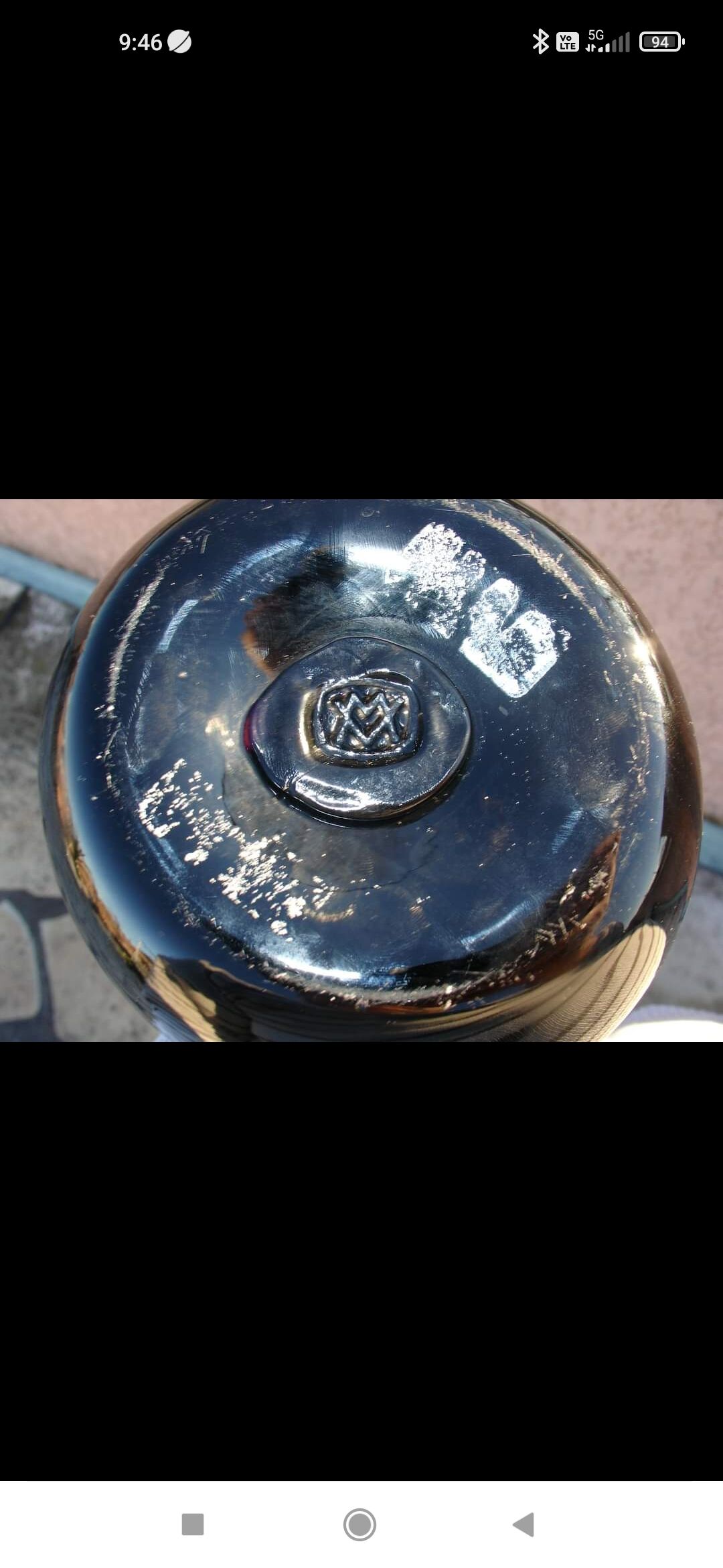 Vase in multi-layered black glass paste with inclusions of gold and other colors, signed by Bob le Bleïs