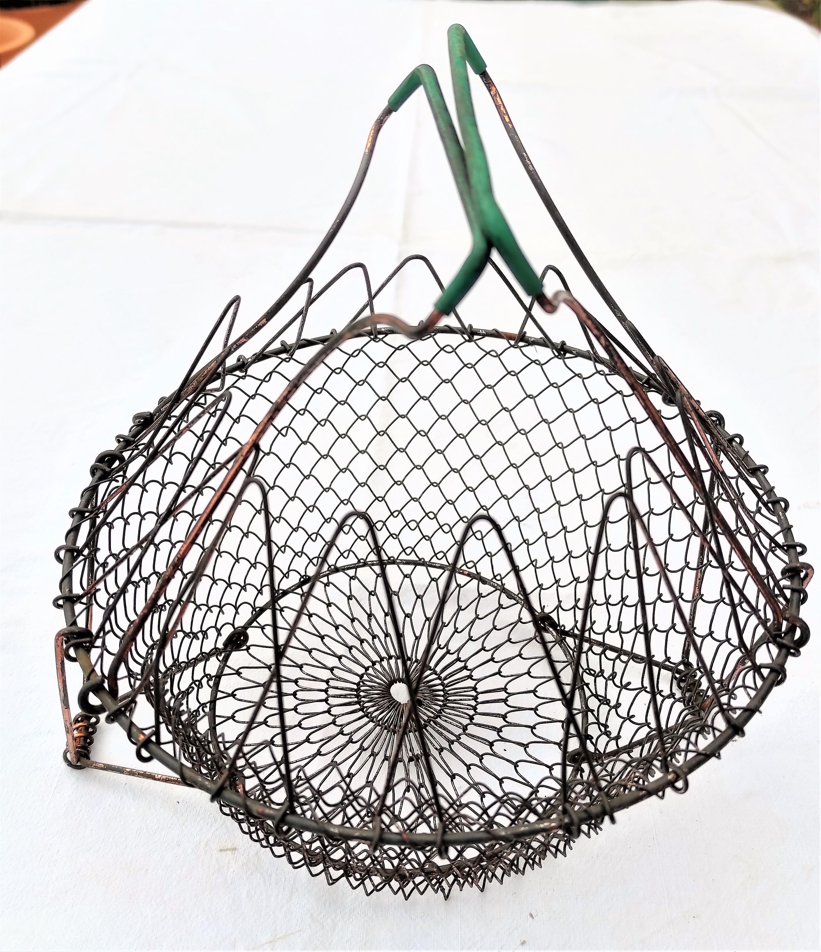 Vintage folding salad basket convertible into a fruit/egg cup ... with its green handles