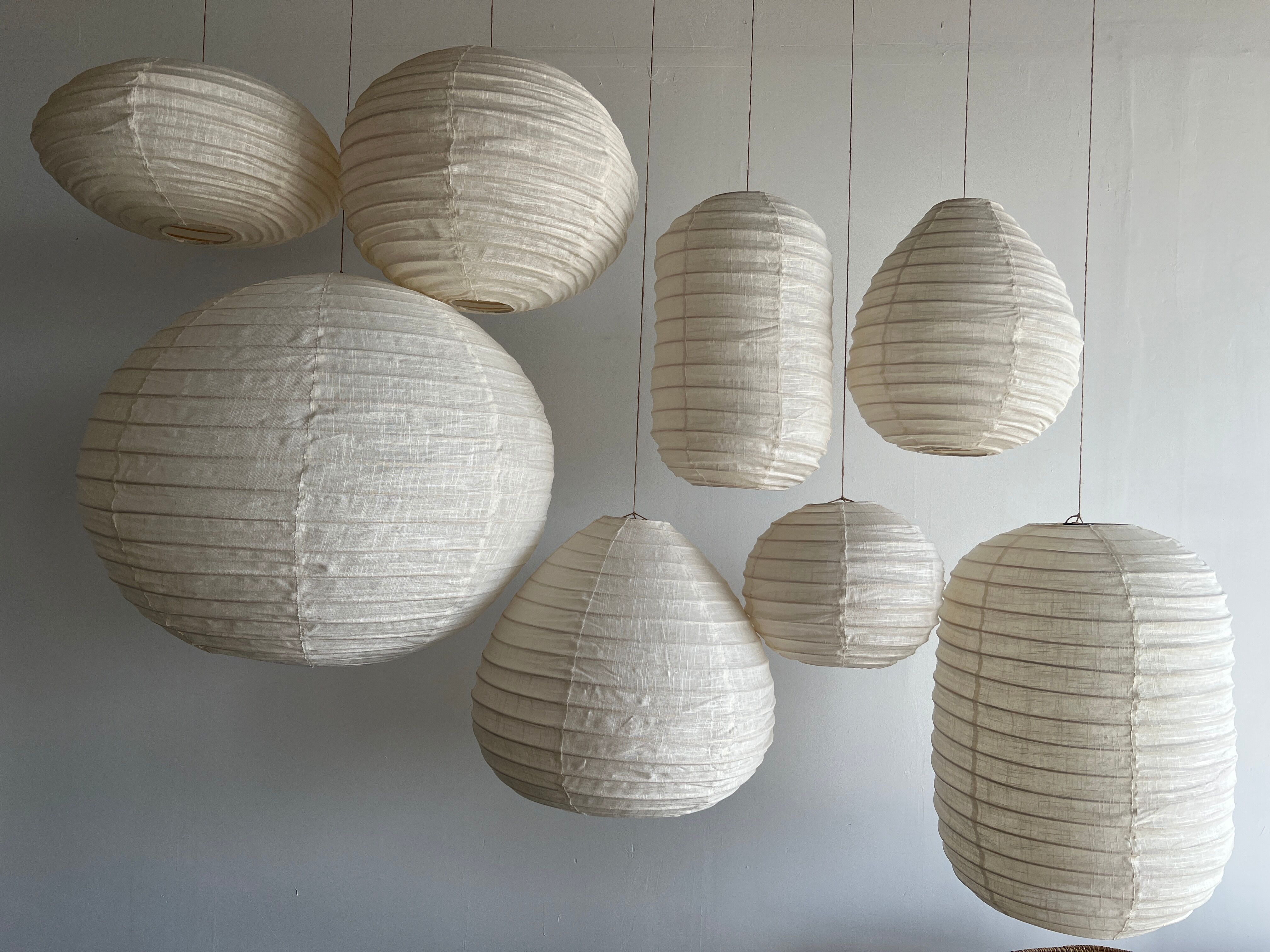 Suspension in rattan and natural japanese linen in the shape of a drop