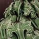 Green vase from Manises with leaf decoration.