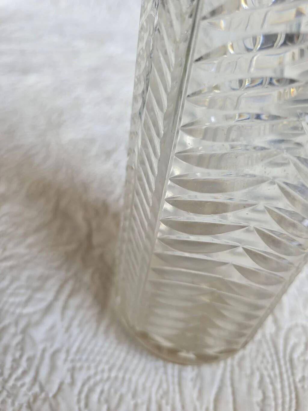Antique cut crystal vase with a scalloped edge, decorated with palmettes.