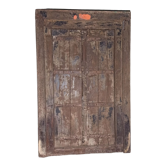 Old wooden door with frame