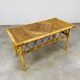 1960s rattan and bamboo coffee table, with its magazine rack.