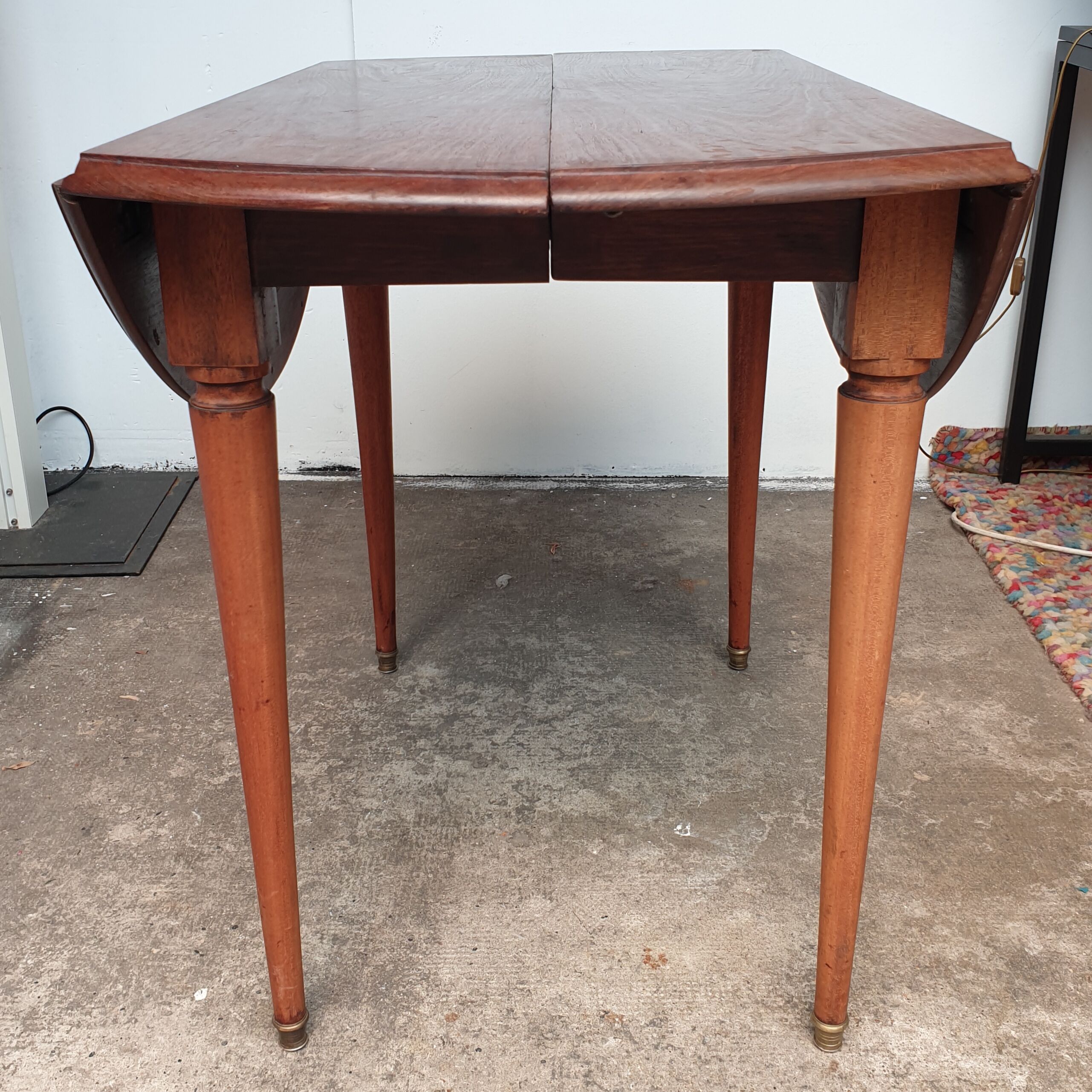 Old mahogany-shuttered round table
