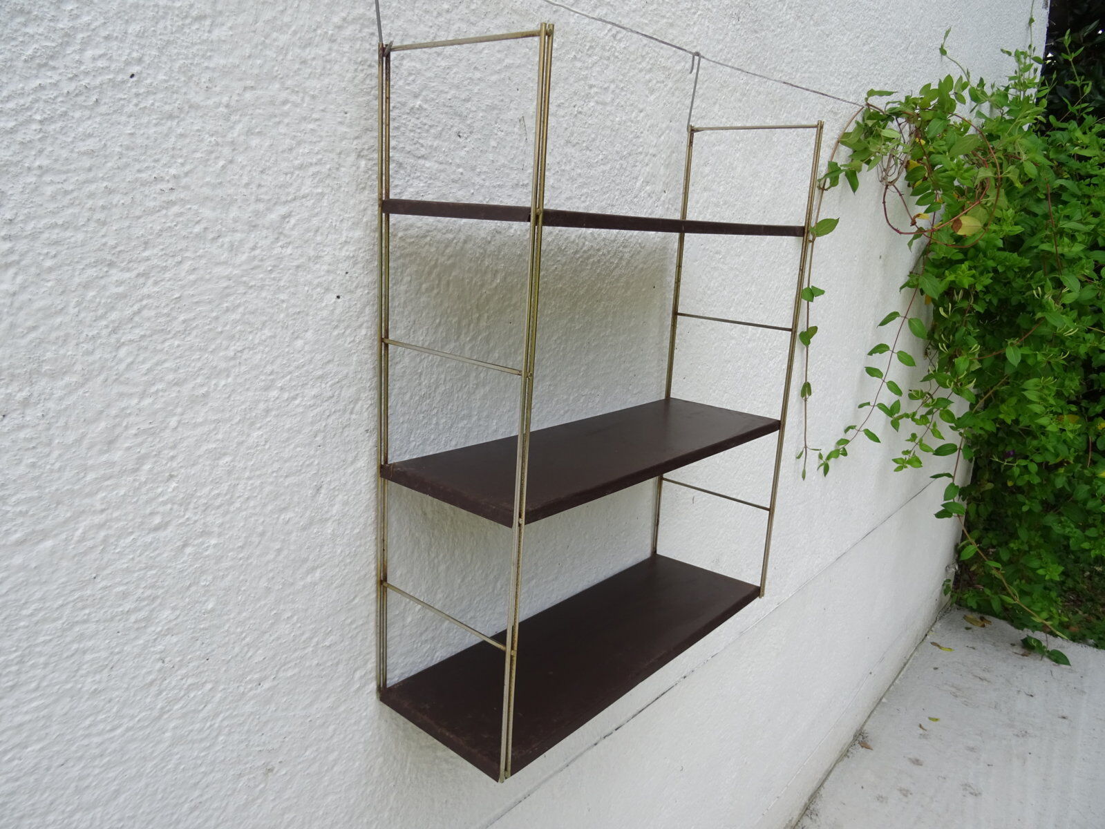 Metal string modular wall shelf