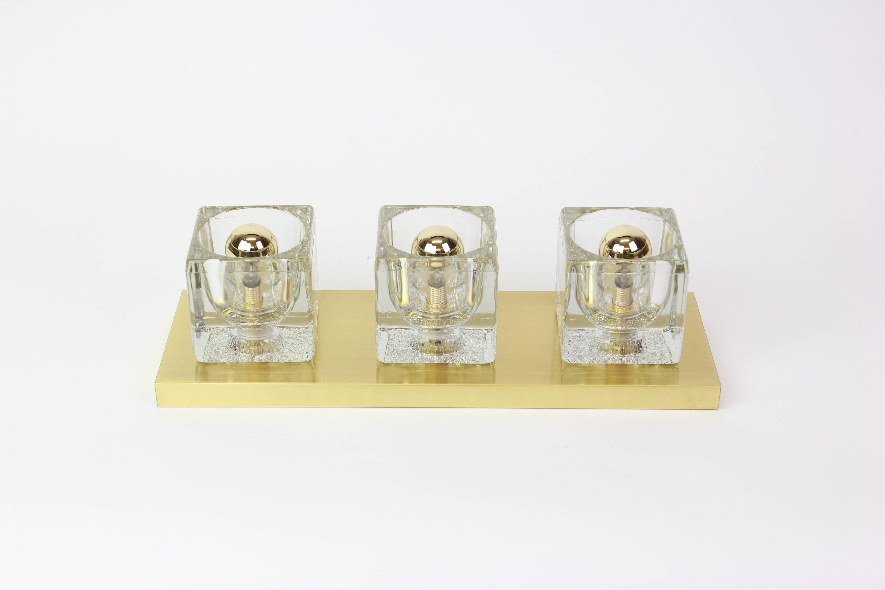 Exclusive wall sconces in crystal and brass by Peill & Putzler, Germany.