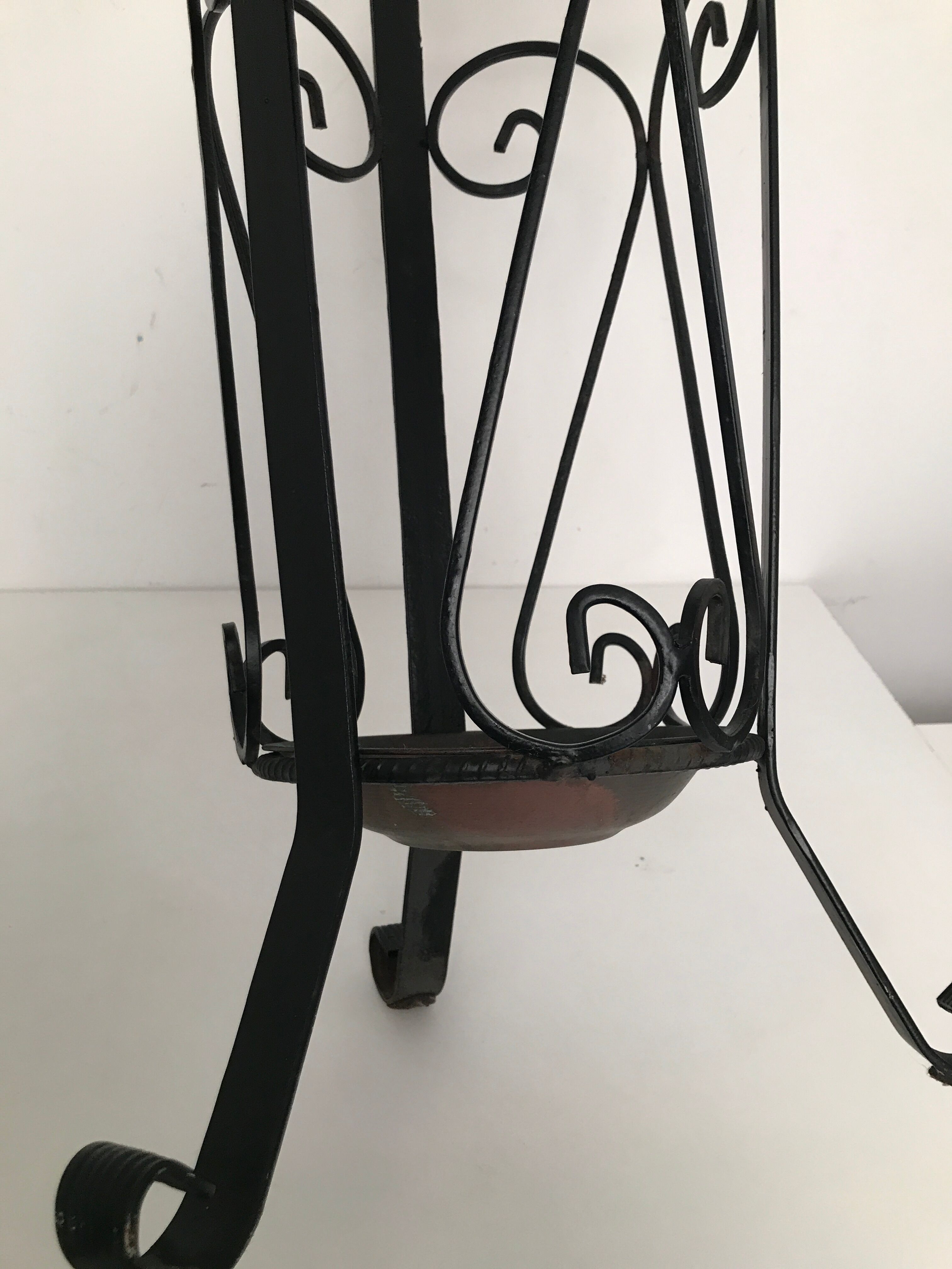 Wrought iron umbrella holder