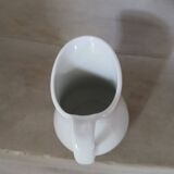 Old porcelain pitcher