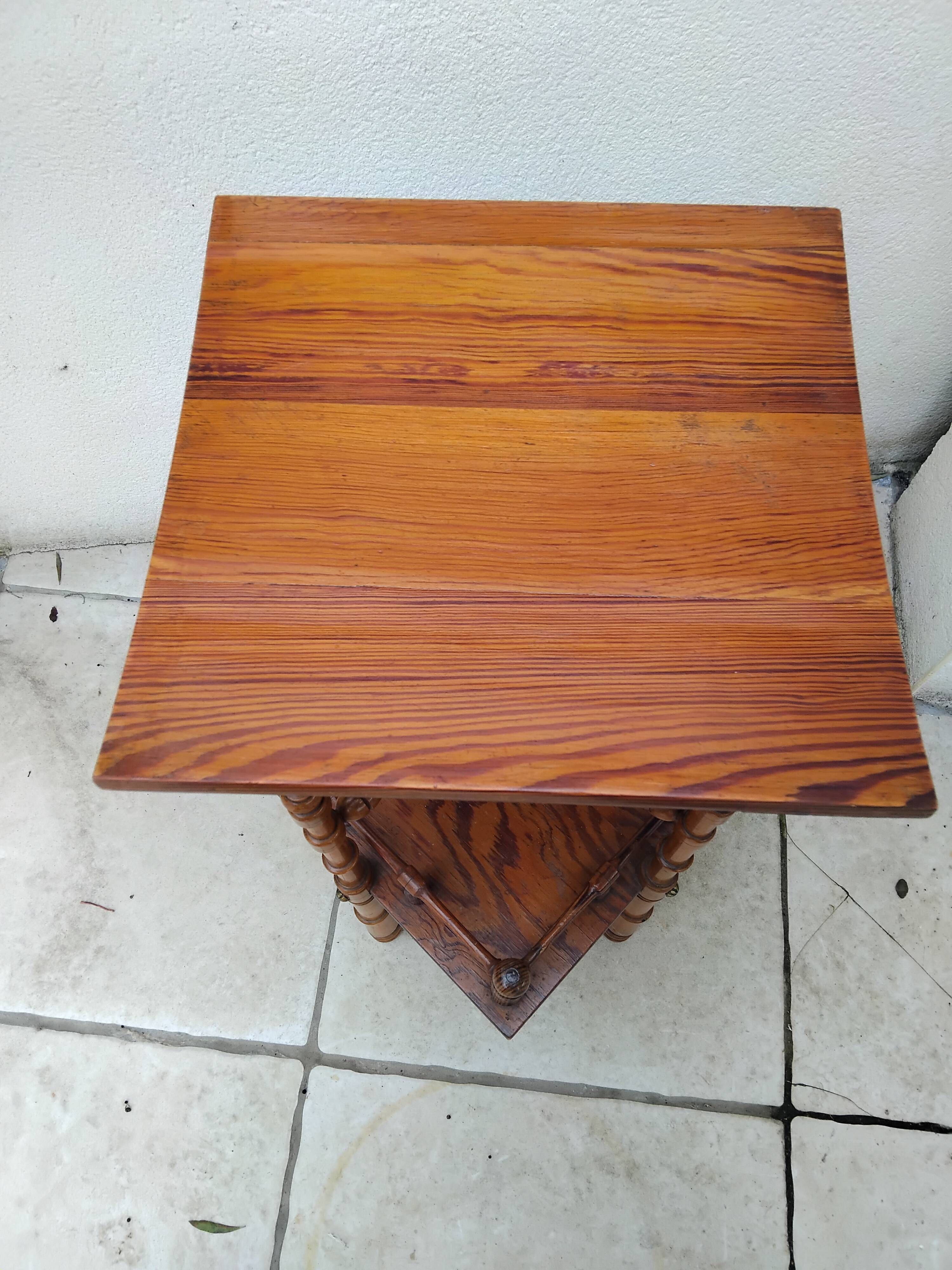 Antique pedestal table in Asian Japonese style.