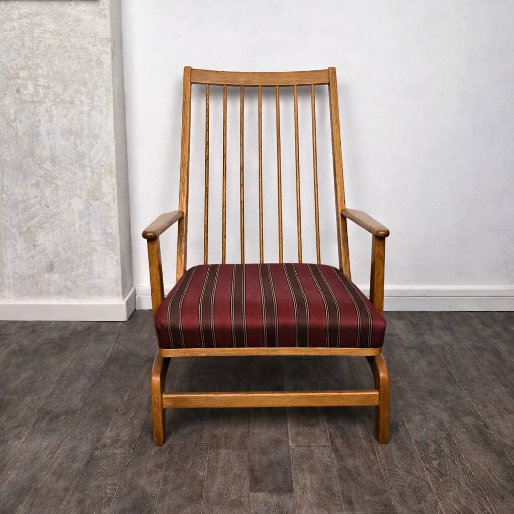 Rocking chair in oak with fabric cushion, Denmark, 1960.