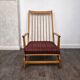 Rocking chair in oak with fabric cushion, Denmark, 1960.