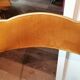 Two gold velvet folding chairs
