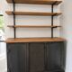 Metal and wood shelves and cupboards.