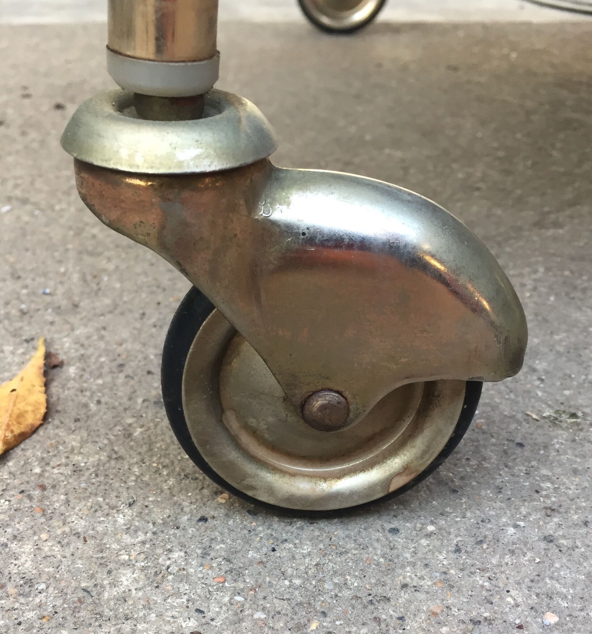 Rolling serving table glass and brass