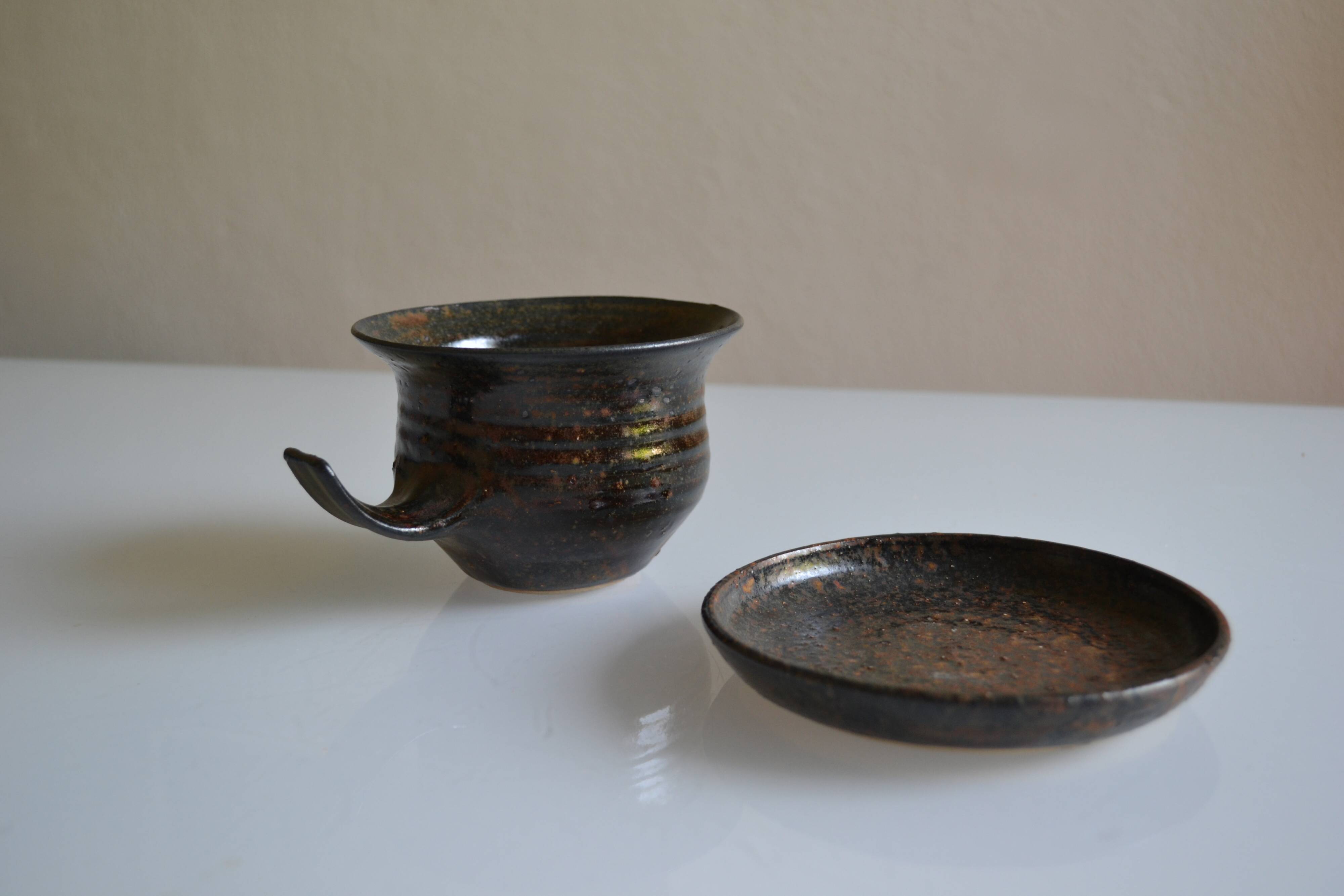 1970s ceramic cup and saucer signed