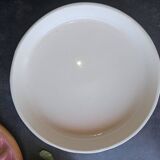 Glazed ceramic dessert plate with strawberry design.